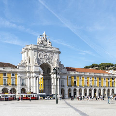 Grab a coffee and people-watch in the Praça do Comércio, a five-minute walk away