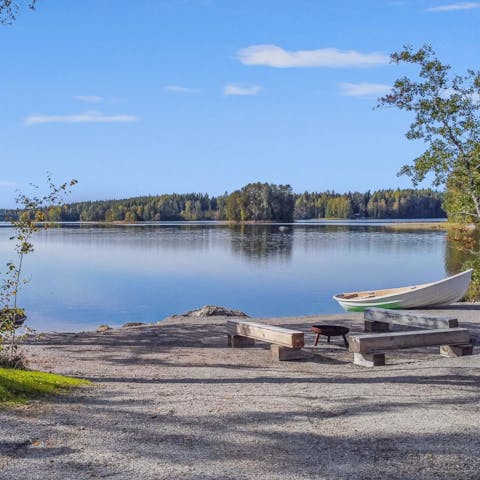 Take the rowboat out onto the peaceful waters of Lake Myllyjärvi 