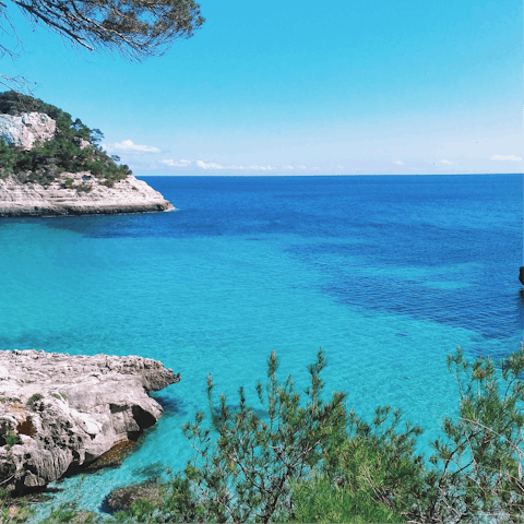 Visit stunning beaches across the west coast of Menorca