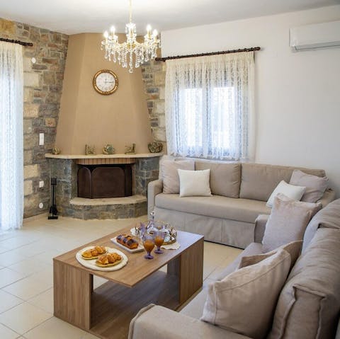 Gather in the cosy living area after a day spent exploring Crete