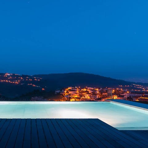 Take a swim under the stars in the infinity pool