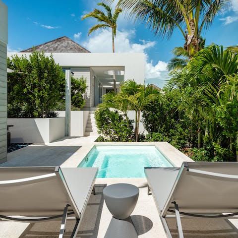 Laze on sun loungers, before cooling off in your private pool 