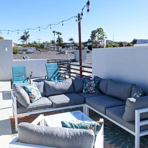 Enjoy cloudless California skies up on the shared rooftop terrace