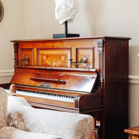 Practise your musical skills on the grand piano 