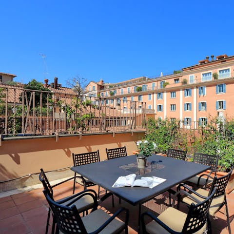 Enjoy beautiful views of Rome's historic buildings from your rooftop