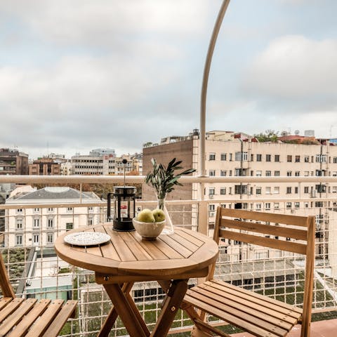 Sip your morning coffee on the balcony as Madrid wakes below