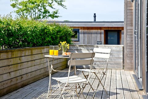 Dine alfresco on the sunny deck in the fresh country air