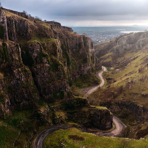 Don your walking shoes and explore Cheddar Gorge, a ten-minute drive away