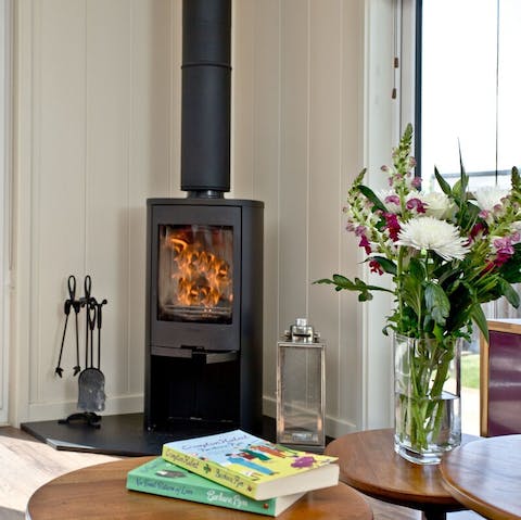 Cuddle up in front of the wood-burner on chilly evenings