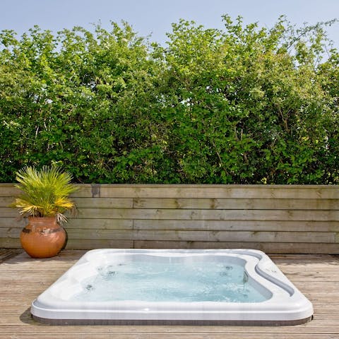 Enjoy a dip in the hot tub, the perfect spot for stargazing 