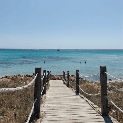 Drive down to Cala Jondal beach in just five minutes