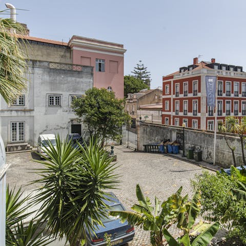 Look out over a quiet courtyard between beautiful 19th-century buildings