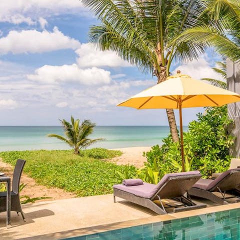 Lounge by the glistening pool or step directly into the beach 