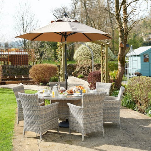 Tuck into breakfast on the dining patio in the garden