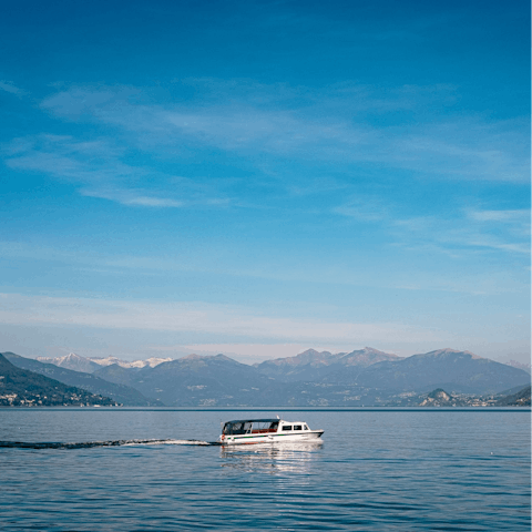 Charter a boat to explore Lake Como from the water