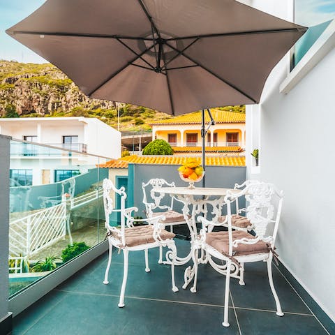 Spend long, leisurely lunches beneath the parasol on the balcony