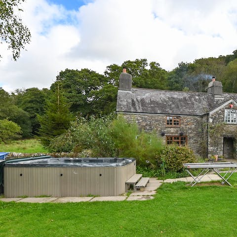 Choose between two large hot tubs in the garden