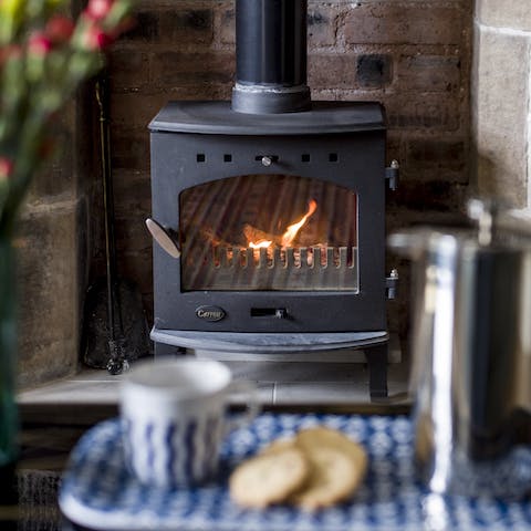 Read a book beside the warmth of the wood-burning stove
