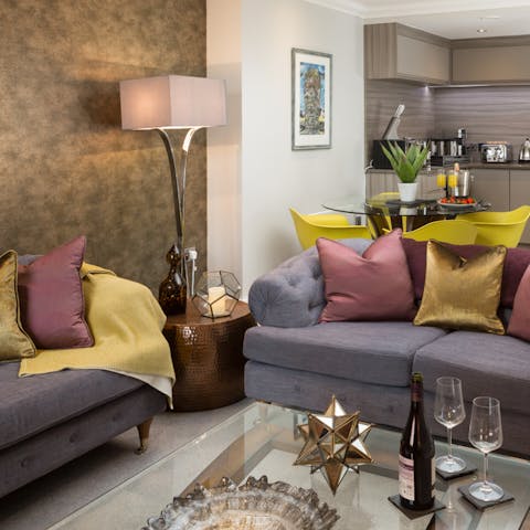 Kick back in the plush living room with a glass of wine after a day of exploring York  