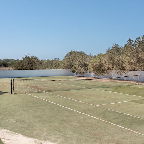 Play a few rounds of tennis on your private courts
