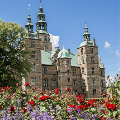 Take a tour of Rosenborg Castle on a warm afternoon