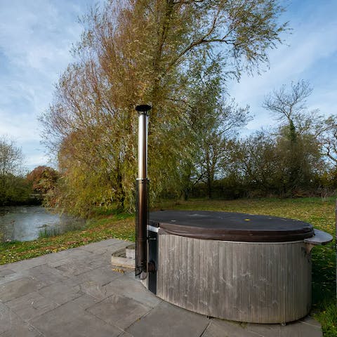 Relax in the wood-fired hot tub after a busy afternoon