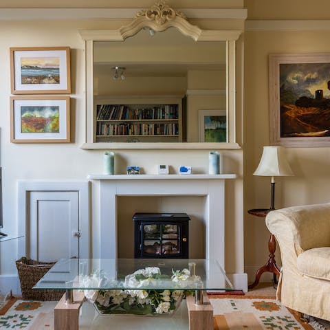 Spend cosy evenings in front of the fireplace – there are board games, films and books to keep everyone entertained 