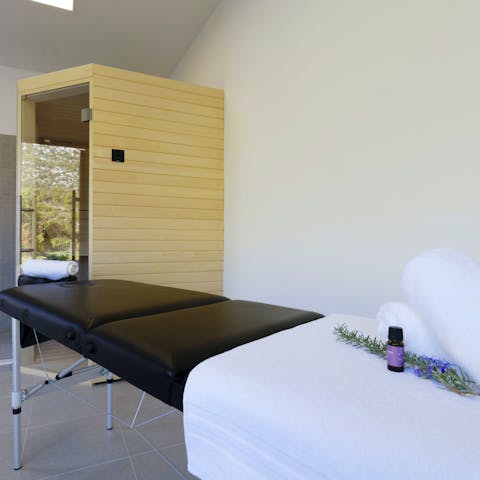 Enjoy a private spa day with a massage and sauna session