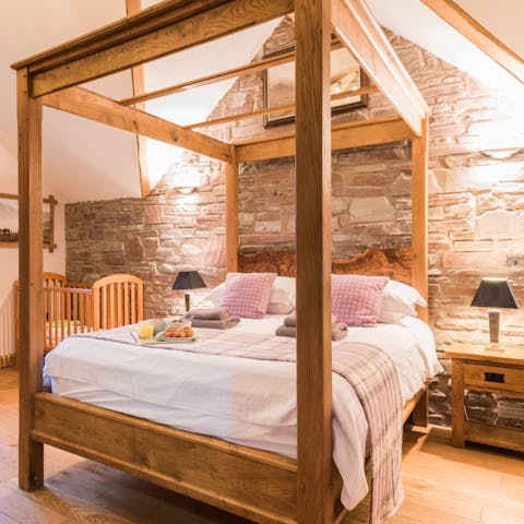 Drift off to sleep in the dreamy four-poster bed