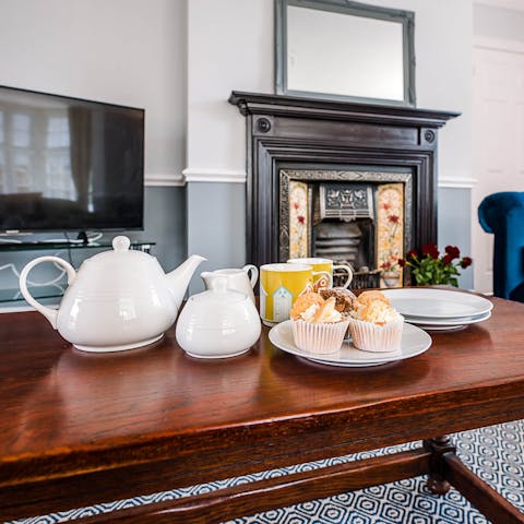 Have afternoon tea by the fireplace