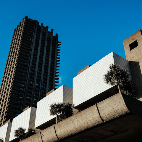 Wander about the Brutalist architecture of the Barbican, eighteen minutes on foot from the apartment Estate, 