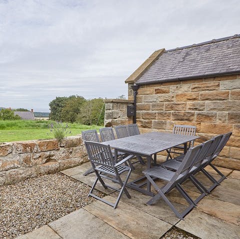 Enjoy alfresco dining in the warmer months and take in the sweeping view