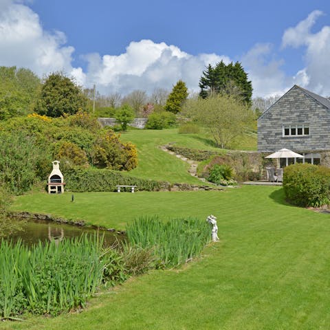 Stay in an 18th-century watermill set on two acres of lush gardens