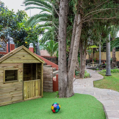 Let the kids kick about in the sheltered playground 