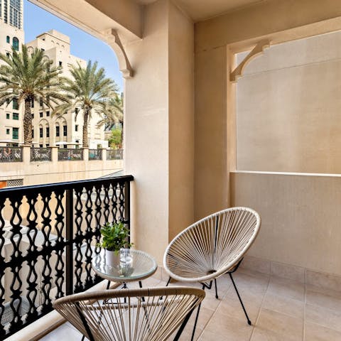 Savour your morning coffee on the balcony, enjoying the scenery of palm trees and clear blue skies