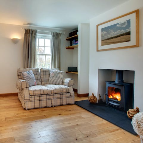 Cosy up in front of the wood-burner on chilly afternoons