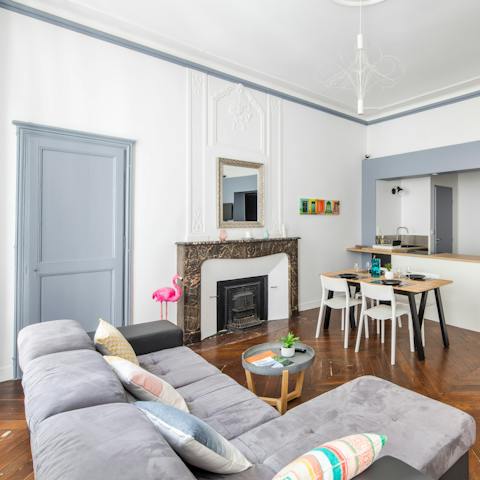 Recharge in your chic apartment, which still has its traditional fireplace and moulding