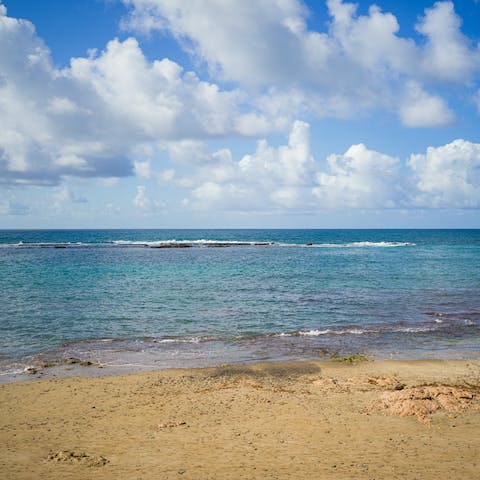 Sprawl out on the golden sand of Las Canteras Beach, just a one-minute walk away