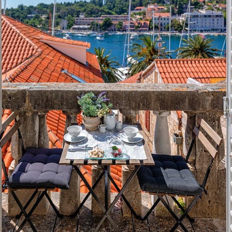 Find the ancient balconies overlooking Hvar's charming harbour