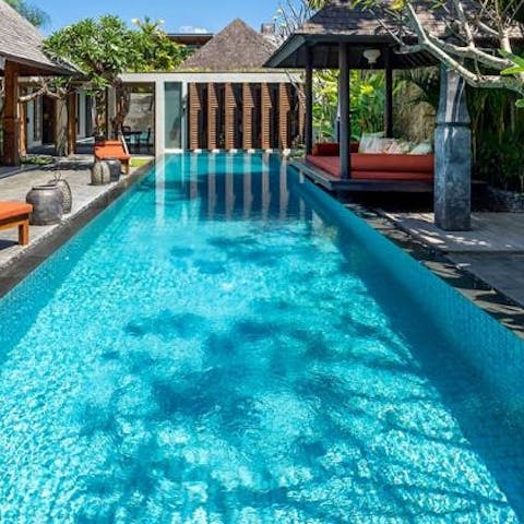 Start your days with a refreshing dip in the swimming pool 