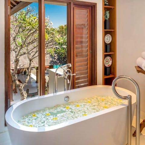 Unwind in the bathtub after a day spent exploring Bali 