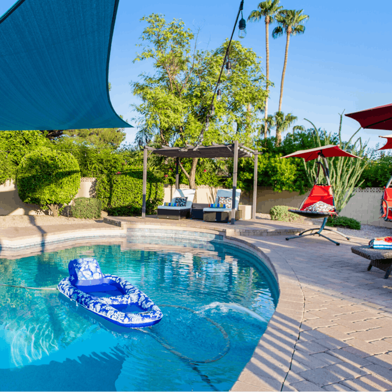 Relax in the shade of the poolside cabana between dips