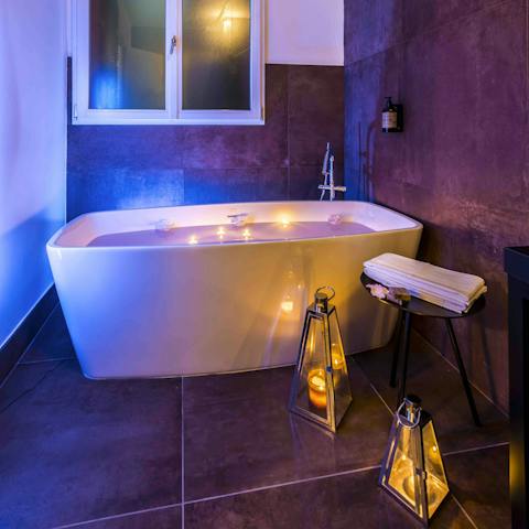 Treat yourself to a soothing soak in the freestanding bath