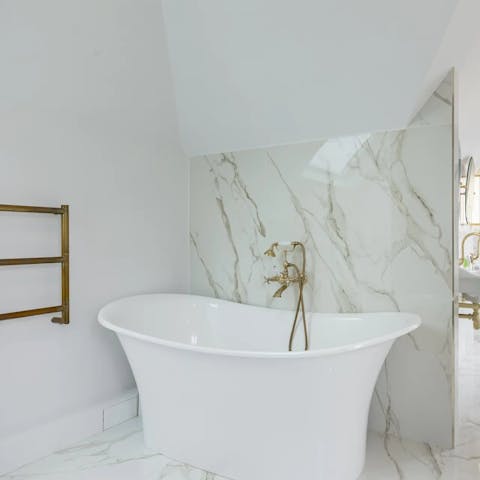 Soak in the freestanding bath after a day of sightseeing