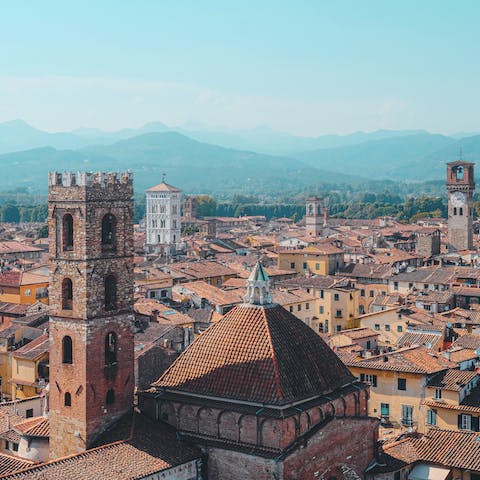Discover the charming medieval city of Lucca, a half-hour drive away
