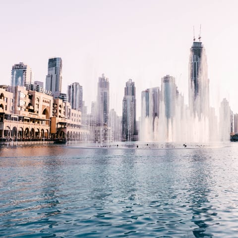 Embrace the spectacle of the Dubai Fountain, a short distance away