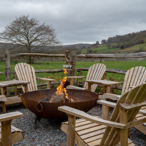 Keep the wine and conversation flowing around the huge fire pit