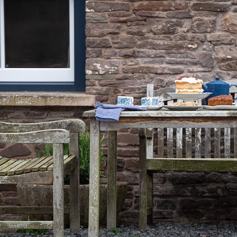 Take your afternoon tea alfresco by having cake and tea out in the courtyard
