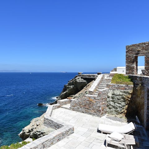 Grab a sunlounger and gaze out to sea 