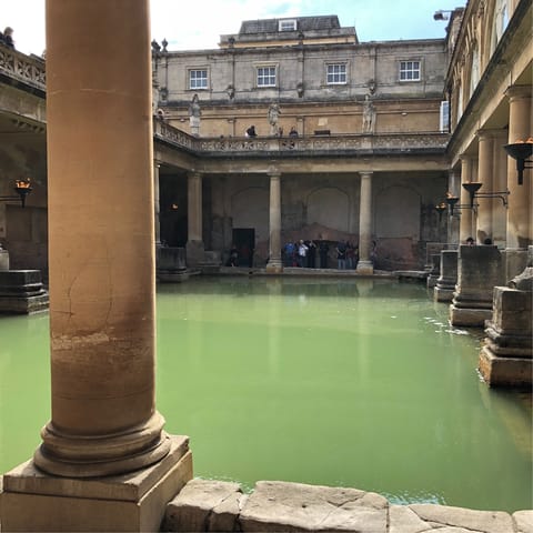  Visit The Roman Baths, a fifteen-minute walk from your cottage